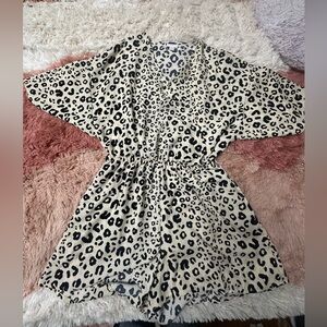 LuLaRoe Cream and Black Leopard Print Top